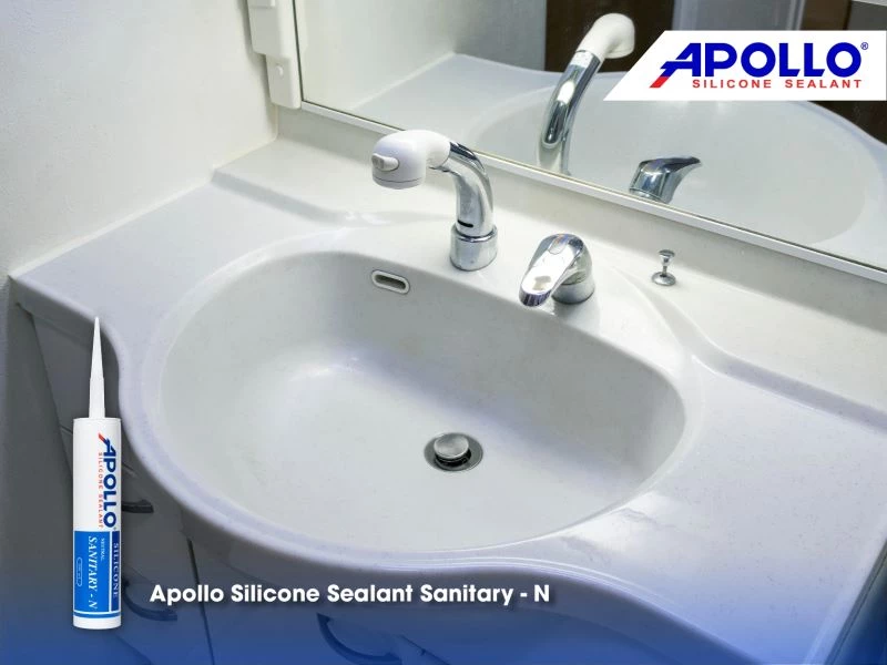 Sử dụng keo Apollo Silicone Sanitary - Vị thi công chống thấm cho trí giữa khe chậu rửa mặt và tường nhà vệ sinh